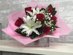 B28 - Half Dozen Roses with White Lily Bouquet